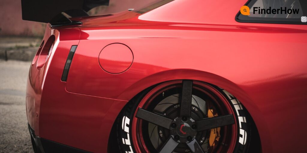 Image of a car with lowered suspension and larger wheels 10 Car Performance Upgrades FinderHow.com